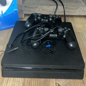 Sony PlayStation 4 Console with DualShock Controllers - Black